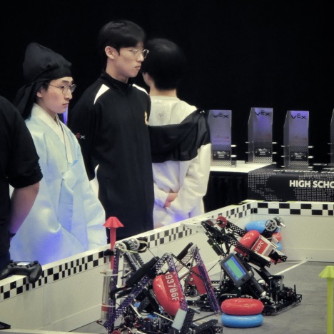 SuhJae wearing a blue Hanbok (도포, traditional Korean clothing) at the 2024-2025 VEX Robotics World Championship in Texas.